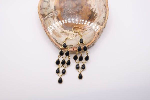 handmade chandelier earrings featuring teardrop-shaped black onyx stones