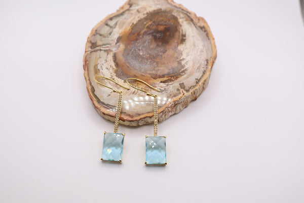 14K yellow gold drop earrings featuring emerald-cut