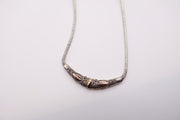 Sterling Silver snake line with 22k gold teardrops necklace