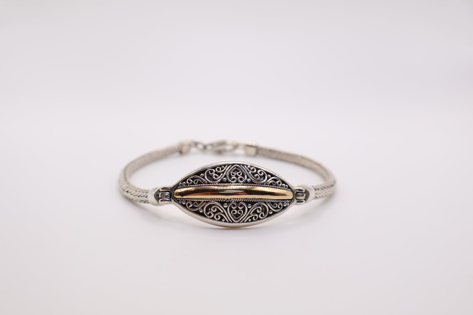 Single snake link with 22k gold center bar bracelet