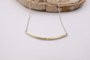 Curved textured 18k gold bar with adjustable sterling silver chain