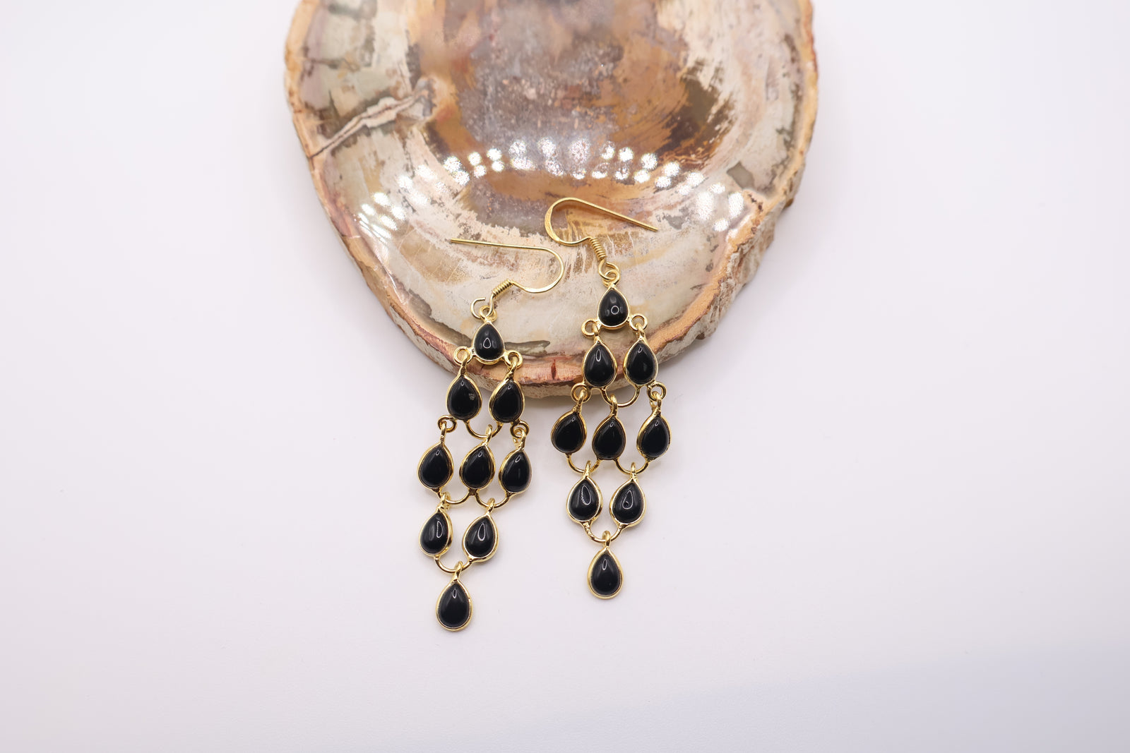 handmade chandelier earrings featuring teardrop-shaped black onyx stones