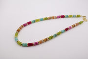 Watermelon beaded necklace with small gold-toned spacers