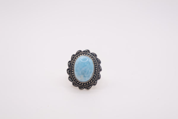 vintage adjustable sterling silver ring featuring a large oval larimar gemstone