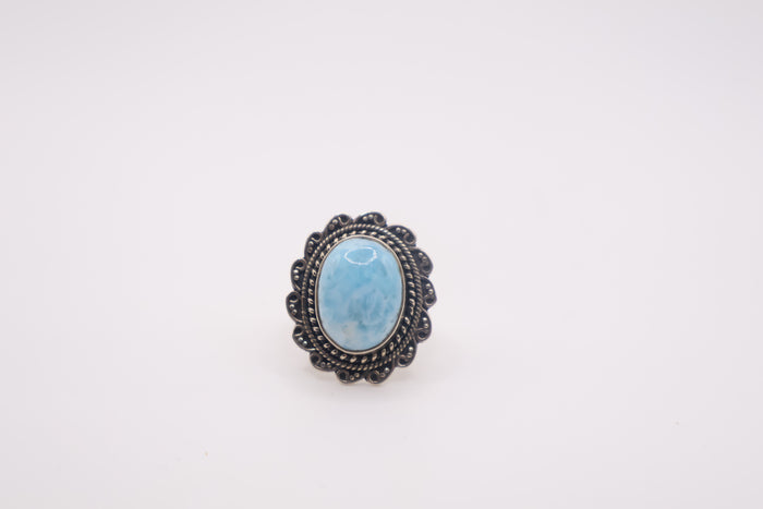 vintage adjustable sterling silver ring featuring a large oval larimar gemstone