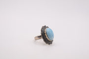 vintage adjustable sterling silver ring featuring a large oval larimar gemstone