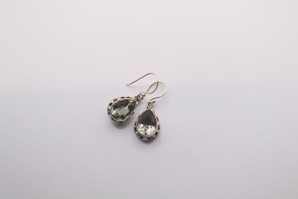 Green amethyst drop earrings crafted from sterling silver