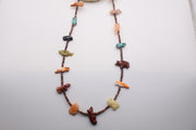 Native American fetish necklace typically made by Navajo or Zuni artists, featuring various hand-carved stone spirit animals