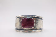 sterling silver cuff bracelet featuring a deep purple spiny oyster shell