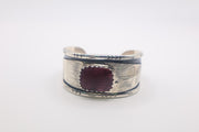 sterling silver cuff bracelet featuring a deep purple spiny oyster shell
