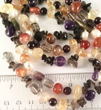 Amethyst Carnelian Garnet Fluorite Individually Knotted  About 36" Necklace.