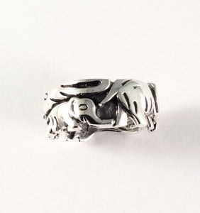 Sterling Silver Elephants band ring. Size About 7 &1/2 R051002