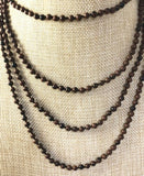 Small Individually Knotted Continuous Obsidian 68 Inches Long Necklace.